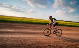 man biking in motion